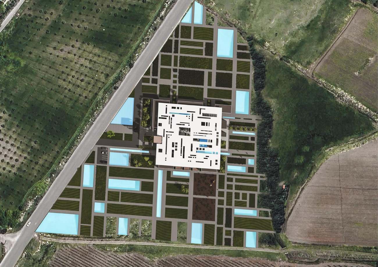 Aerial model of the building within its fields